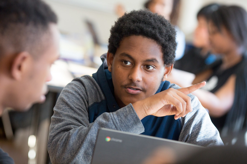 Student-at-computer-with-classmate